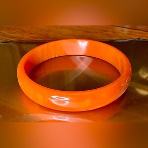 Vintage marbled orange Bakelite bangle